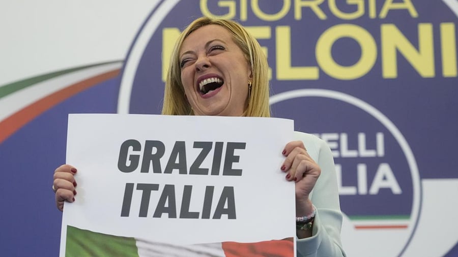 Far-Right party Brothers of Italy's leader Giorgia Meloni shows a placard reading in Italian "Thank you Italy" at her party's electoral headquarters in Rome, early Monday, September 26, 2022. Credit: AP Photo