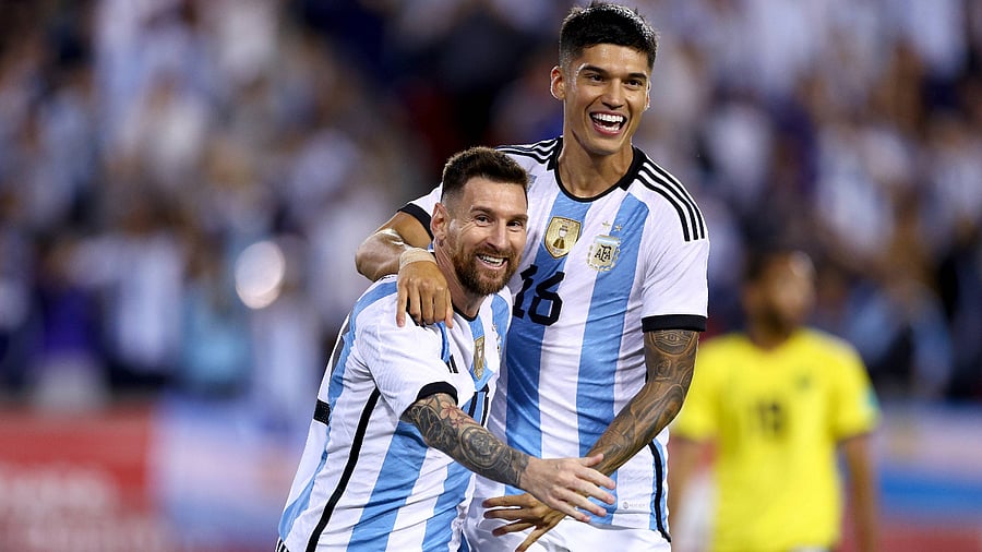 Lionel Messi of Argentina celebrates his goal with teammate Joaquin Correa in the second half against Jamaica at Red Bull Arena on September 27, 2022. Credit: AFP Photo