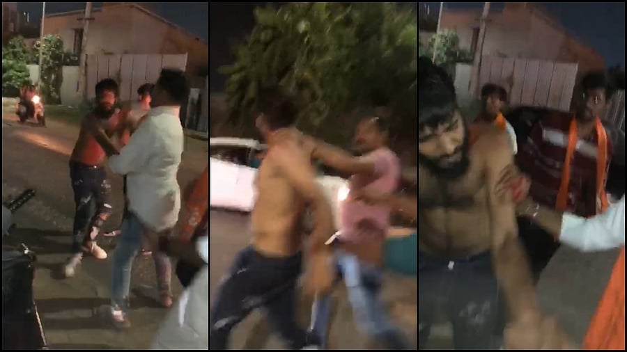 One of the videos shows a person being stripped, punched, and kicked by half-a-dozen men in saffron scarves amidst the busy traffic. Credit: Special Arrangement