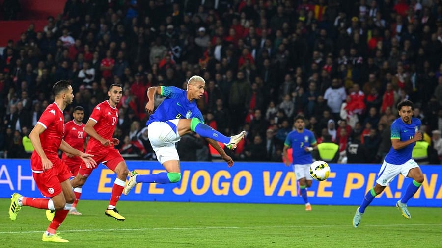 Brazil's forward Richarlison shoots the ball during the friendly football match between Brazil and Tunisia at the Parc des Princes in Paris on September 27, 2022. Credit: AFP Photo