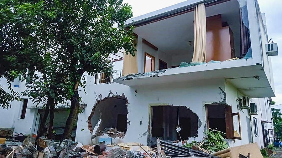 An illegally built resort of a man named Pulkit Arya after it was partially demolished by authorities overnight, in Pauri Garhwal district. Credit: PTI Photo