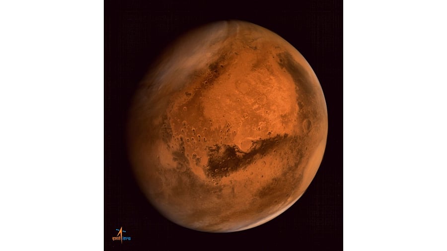 A handout photograph received from the Indian Space Research Organisation (ISRO) shows an image of the planet Mars taken by the ISRO Mars Orbiter Mission (MOM) spacecraft. Credit: AFP/ ISRO Photo
