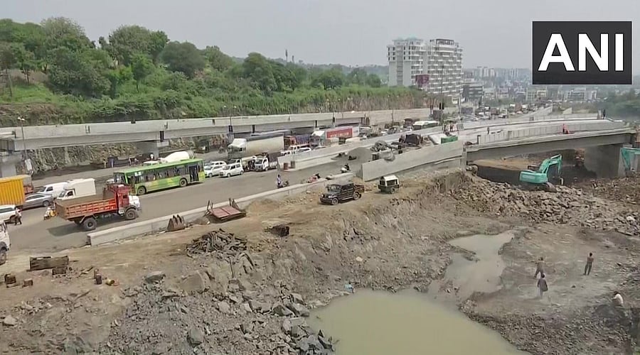 The bridge on Mumbai-Bengaluru Highway (NH4) in the Chandani Chowk area of the city was demolished at 1 am on Sunday. Credit: Twitter/@ANI