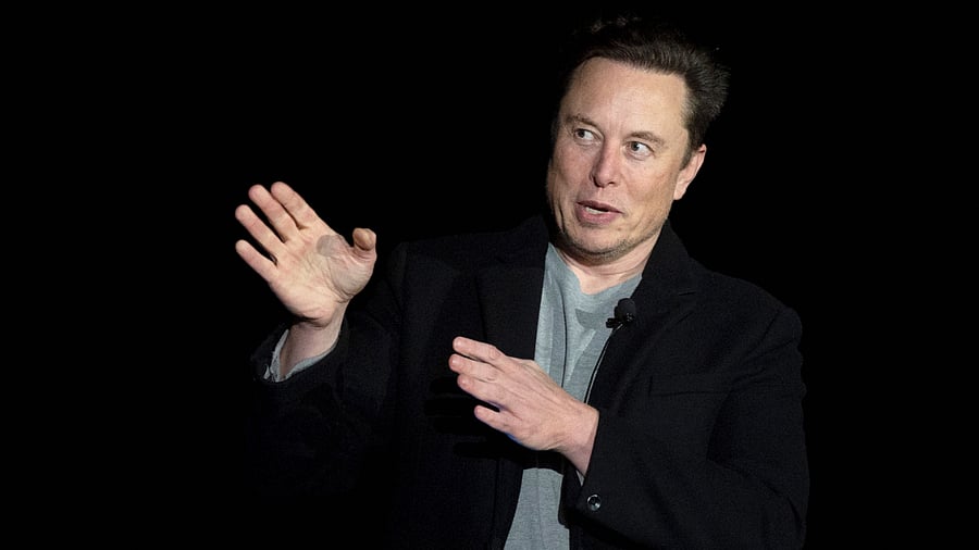 Elon Musk speaks during a press conference at SpaceX's Starbase facility, February 10, 2022. Credit: AFP File Photo
