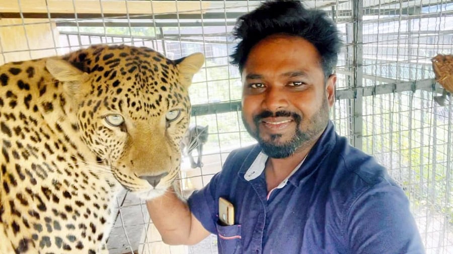 Gidikumar Patil, an orthopaedic doctor from Andhra Pradesh with his pet 'Yasha'. Credit: PTI Photo