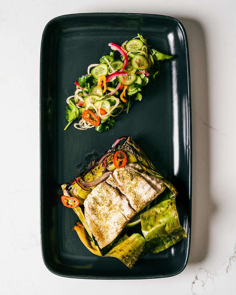 Banana leaf baked fish with lemon myrtle and burnt leeks.  Pics courtesy: The Oberoi, Bengaluru