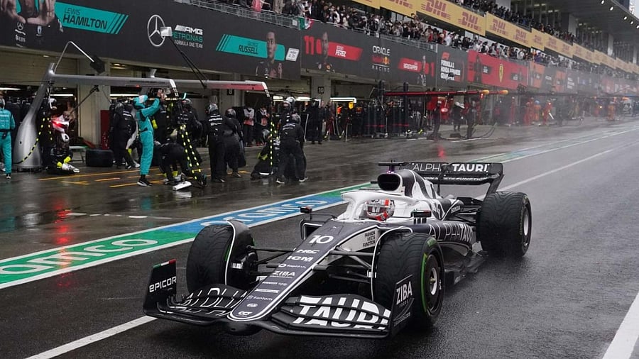AlphaTauri's French driver Pierre Gasly drives in the pit lane during the Formula One Japanese Grand Prix at Suzuka. Credit: AFP Photo