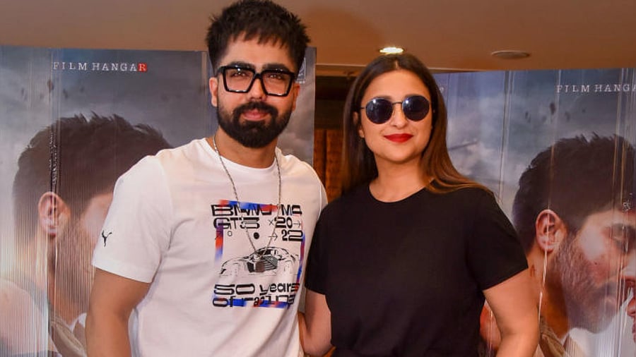 Parineeti Chopra with Harrdy Sandhu during a promotional event of their upcoming film 'Code Name Tiranga'. Credit: PTI Photo