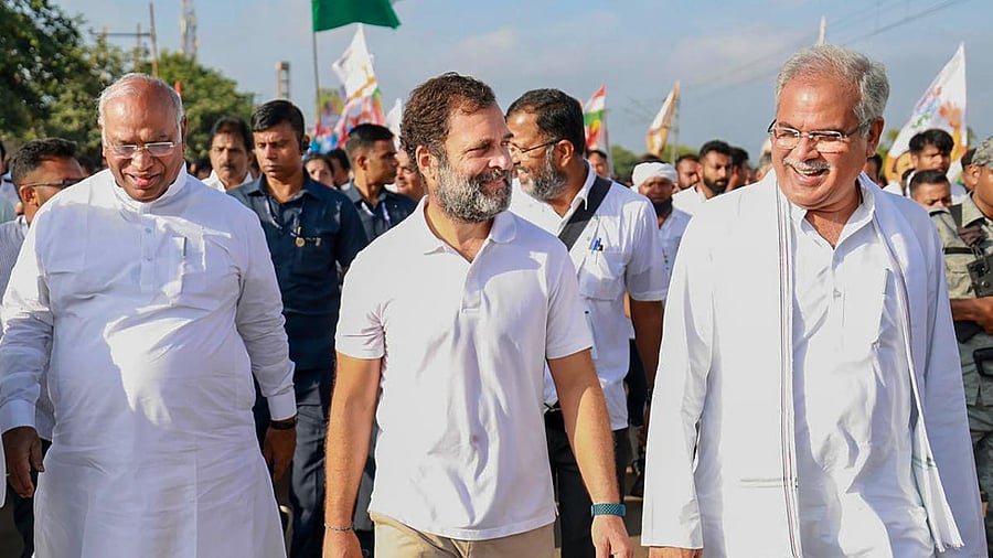 Congress leader Rahul Gandhi with party leaders Mallikarjun Kharge and Bhupesh Baghel during the party's 'Bharat Jodo Yatra', in Ballari. Credit: PTI Photo