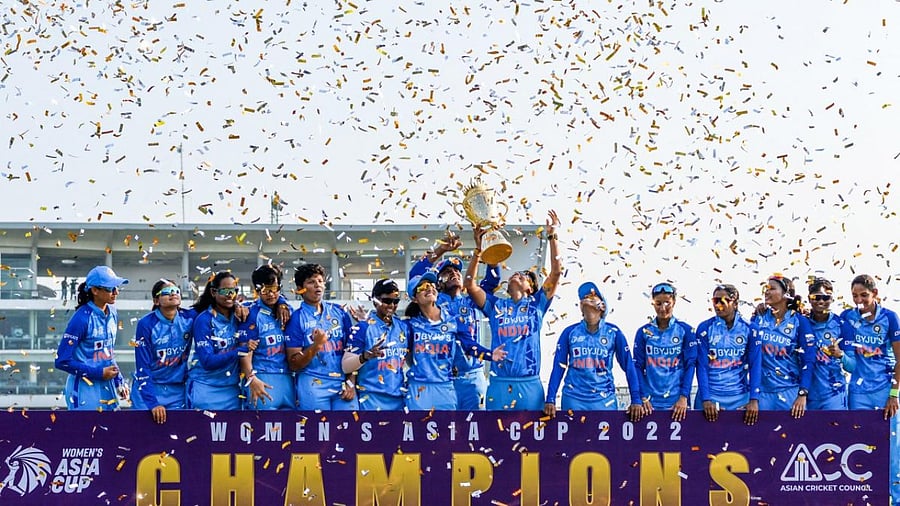 India’s cricketers celebrate their victory at the end of the women's Asia Cup final cricket match between India and Sri Lanka. Credit: AFP Photo