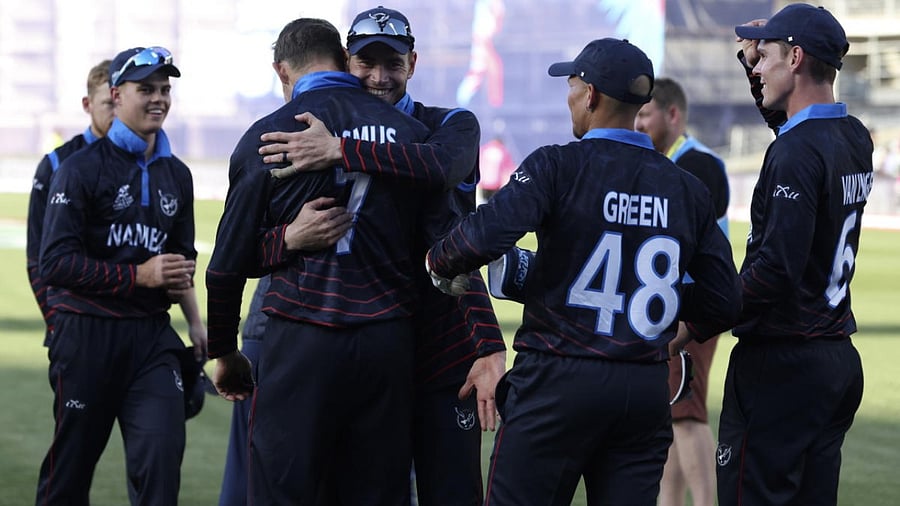 Namibia's players celebrate their win over Sri Lanka in their T20 World Cup Cricket match in Geelong, Australia. Credit: AP Photo