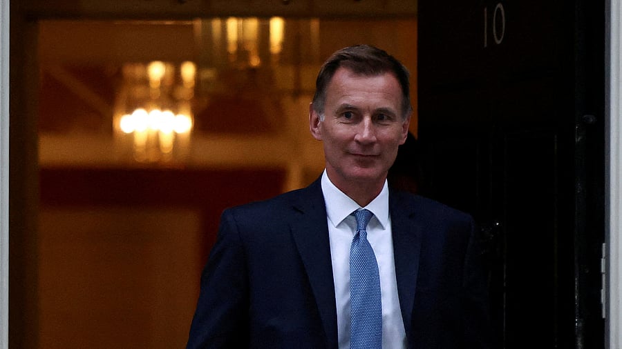 Chancellor of the Exchequer Jeremy Hunt leaves 10 Downing Street in London, Britain, October 14, 2022. Credit: Reuters Photo