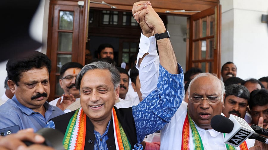 New Congress president Mallikarjun Kharge (right) with electoral rival Shashi Tharoor (left). Credit: Reuters Photo