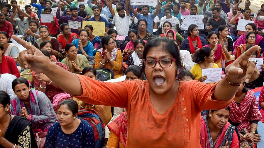 Pre-Teacher Education Test (PTET) qualified candidates of 2014 batch during the 3rd day of hunger strike against the alleged SSC scam at Salt Lake, in Kolkata. Credit: PTI Photo