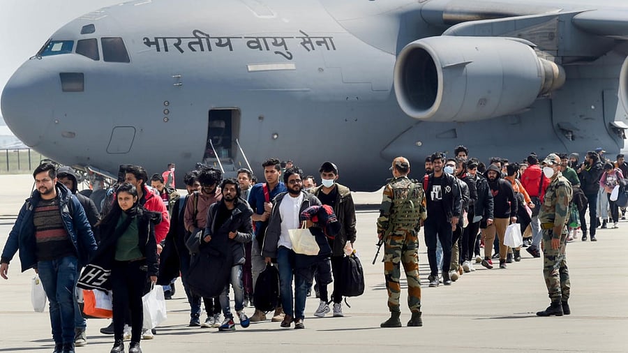 File photo of Indian students evacuated from war-hit Ukraine after deboarding an IAF plane. Credit: PTI Photo
