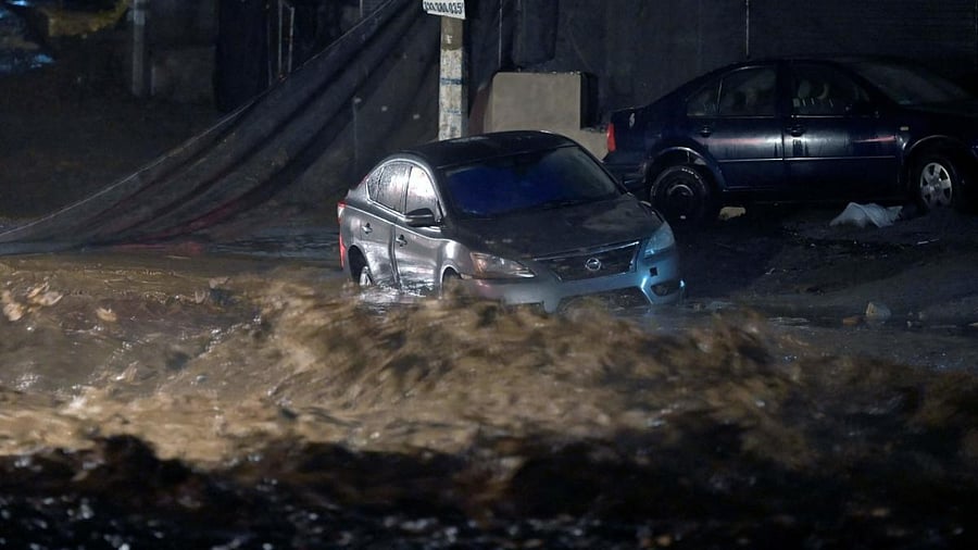 Picture of a flooded street during the arrival of Hurricane Roslyn, in Puerto Vallarta, Jalisco State, Mexico. Credit: AFP Photo