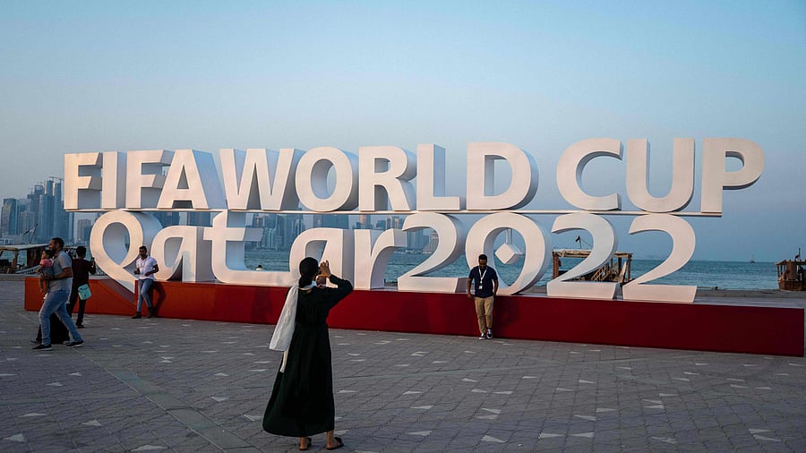 But traders, who have long been preparing for the World Cup, are expecting more. Nama cites the camels kept in an enclosure on a square as one attraction. Credit: AFP Photo