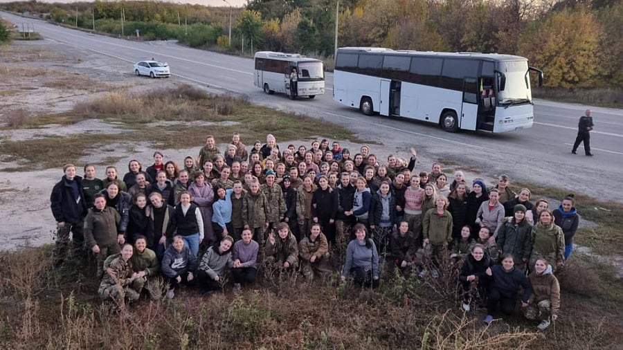 This file handout picture taken and released by Ukrainian presidential chief of staff, Andriy Yermak on October 17, 2022 shows freed Ukrainian female prisoners posing for a picture after their exchange in an unknown location in Ukraine. Credit: AFP File Photo