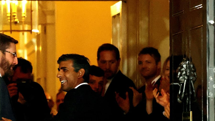 Britain's new Prime Minister Rishi Sunak enters Number 10 Downing Street. Credit: Reuters Photo
