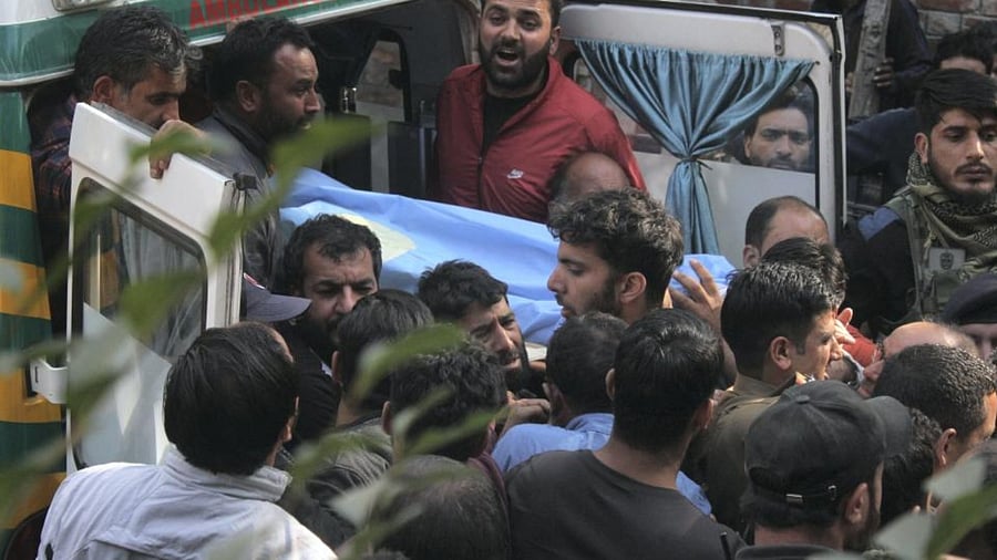 The body of Puran Krishan Bhat, a Kashmiri Pandit who was shot dead by militants in the Shopian district of Jammu and Kashmir, Saturday, Oct 15, 2022.Credit: PTI Photo