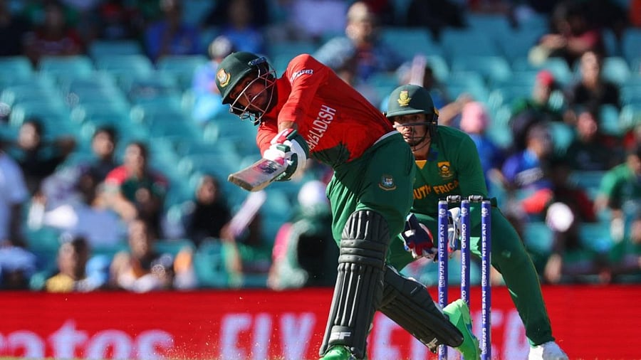 Bangladesh's Mehidy Hasan Miraz plays a shot during the ICC men's Twenty20 World Cup 2022 cricket match between South Africa and Bangladesh. Credit: AFP Photo