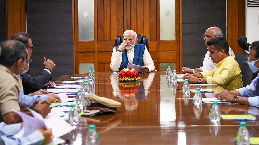 Prime Minister Narendra Modi during a high level meeting to review situation in Morbi, in Ahmedabad. Credit: PTI Photo
