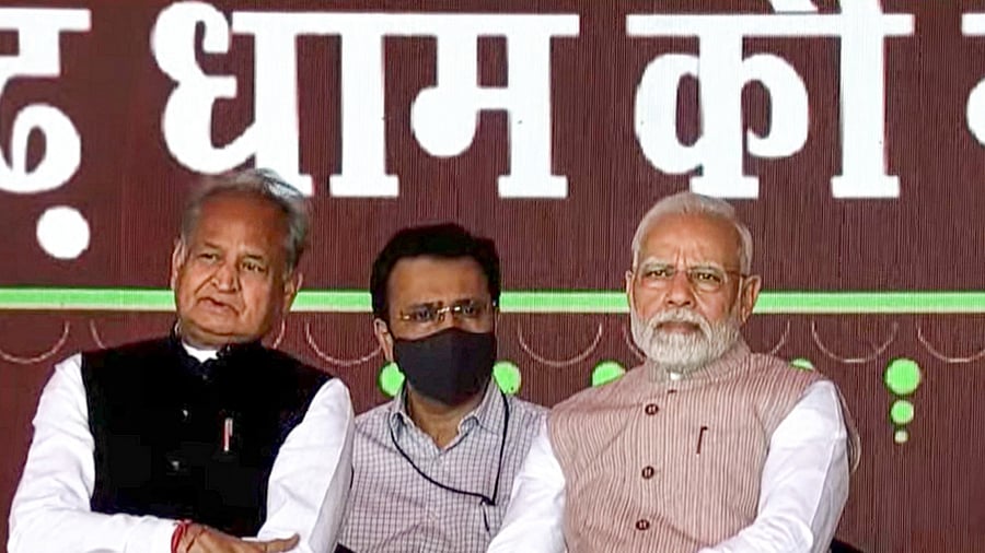 Prime Minister Narendra Modi with Rajasthan Chief Minister Ashok Gehlot during the 'Mangarh Dham Ki Gaurav Gatha' programme, in Banswara, Tuesday, Nov. 1, 2022. Credit: PTI Photo