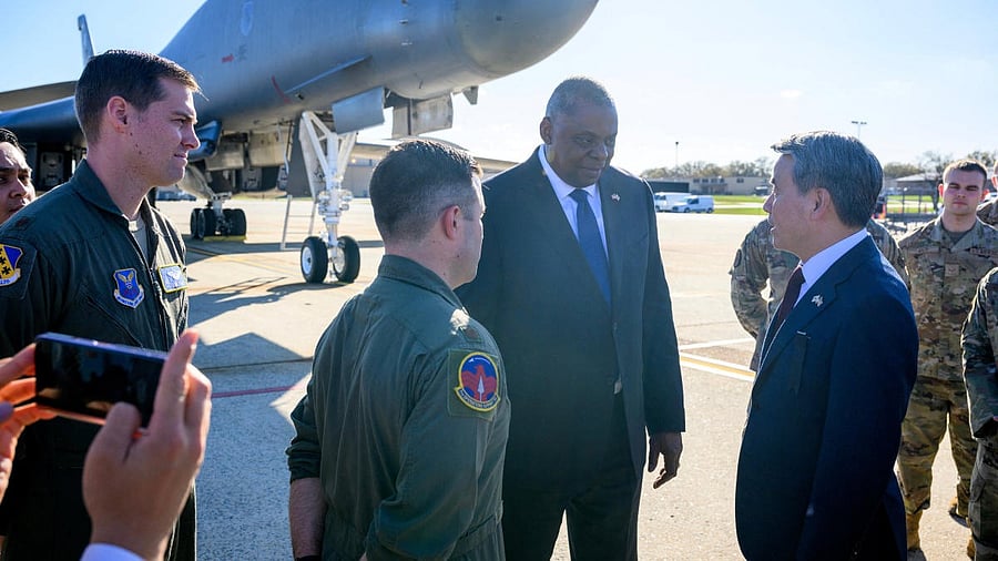 US Secretary of Defense Lloyd Austin (C) and South Korea's Minister of National Defense Lee Jong-sup (R) talk in front of a B1 bomber during a visit to Andrews Air Force Base in Maryland. Credit: Reuters photo