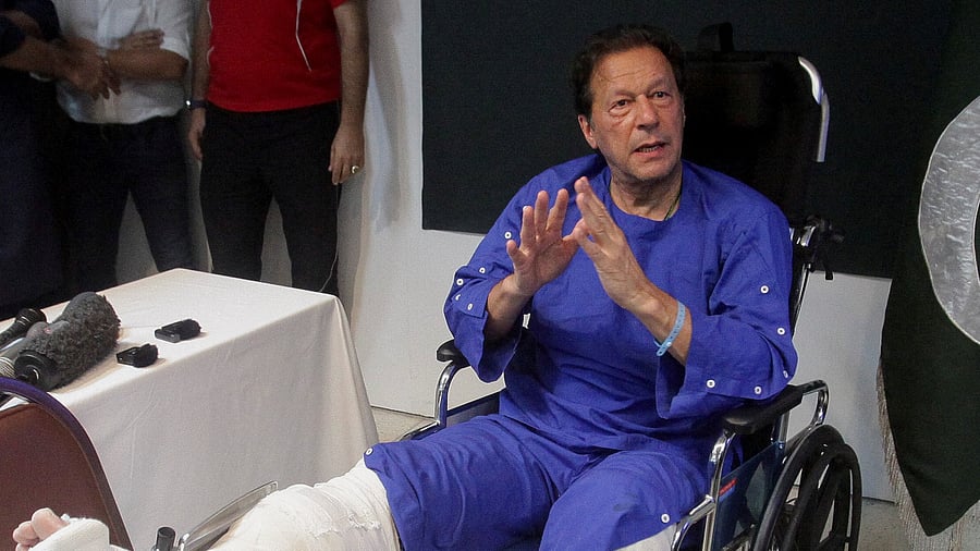 The Pakistan Tehreek-e-Insaf (PTI) chairman also signed an autograph for his saviour on the same shirt that he wore while apprehending the shooter. Credit: Reuters Photo