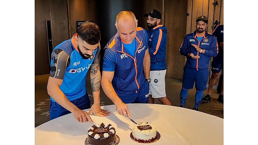 Cricketer Virat Kohli and teammates during the former's birthday celebrations in Australia. Credit:  PTI Photo