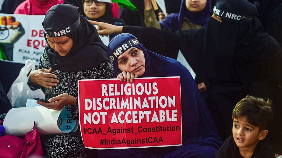 Women from Muslim community protest against CAA. Credit: PTI File Photo