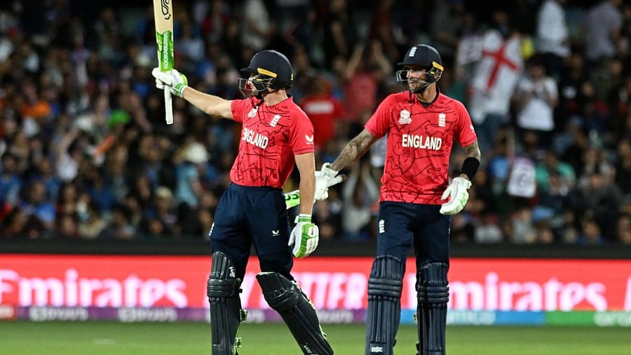 England's Captain Jos Buttler (L) celebrates reaching his half century (50 runs) during the ICC men's Twenty20 World Cup 2022 semi-final cricket match between England and India at The Adelaide Oval on November 10, 2022 in Adelaide. Credit: AFP Photo