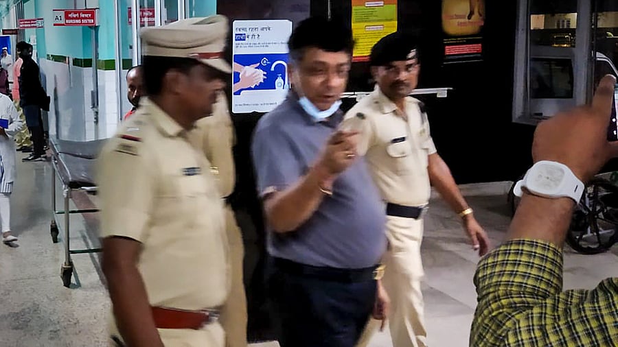 Former Andaman and Nicobar chief secretary Jitendra Narain being brought at a hospital for a medical checkup following his arrest in connection with an alleged gang rape case, in Port Blair, Thursday. Credit: PTI Photo
