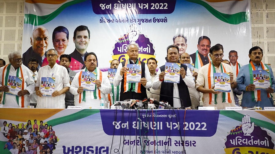 Rajasthan CM and senior Congress leader Ashok Gehlot with party leaders releases the party manifesto for the Gujarat polls. Photo Credit: PTI Photo