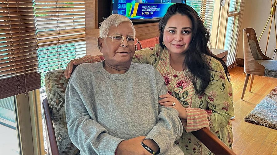 Rashtriya Janata Dal (RJD) President Lalu Prasad Yadav with his daughter Rohini Acharya. Credit: PTI Photo