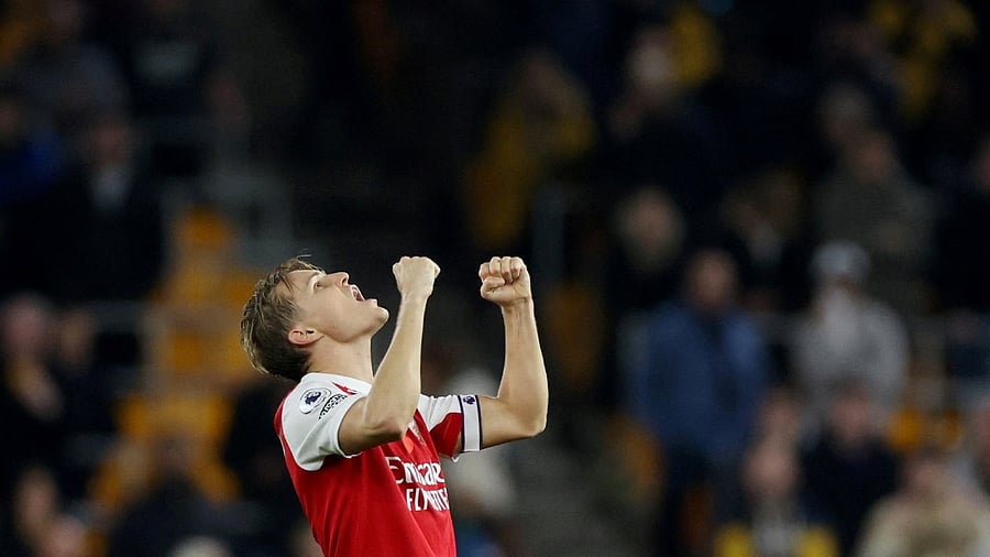 Arsenal's Martin Odegaard celebrates after the match against Wolves. Credit: Reuters Photo