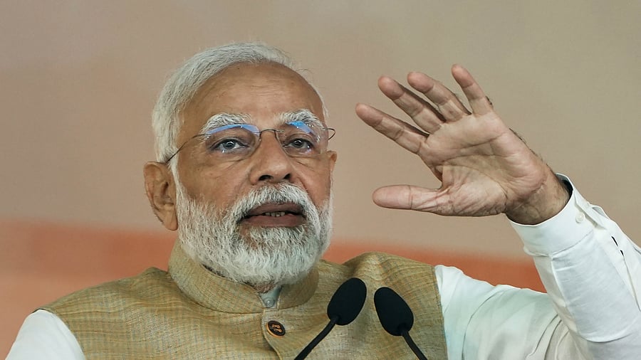 In a three- day  visit the Prime Minister inaugurated and laid the foundation stone of development projects worth around Rs 22,000 crore in Gujarat.  Credit: PTI Photo