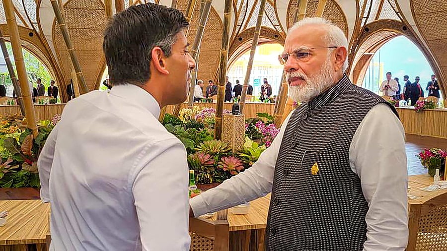 PM Modi interacts with United Kingdom Prime Minister Rishi Sunak. Credit: PTI Photo