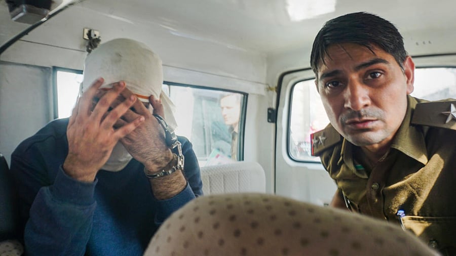 Aaftab Poonawala, accused in murder of his live-in partner Shraddha Walkar, being brought to the Mehrauli forest area. Photo Credit: PTI Photo