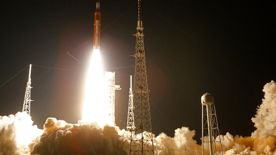 NASA's next-generation moon rocket, the Space Launch System (SLS) rocket with the Orion crew capsule, lifts off from launch complex in Florida. Credit: Reuters Photo