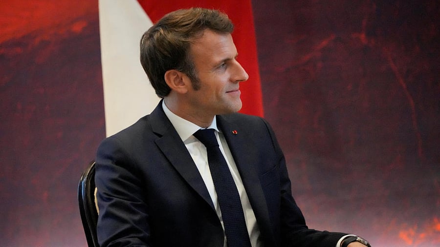 French President Emmanuel Macron sits during his meeting with Indonesia President Joko Widodo, at the G20 leaders' summit in Nusa Dua, Bali, Indonesia, November 15, 2022. Credit: Reuters Photo