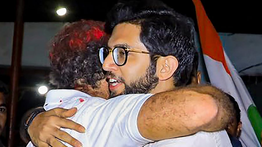 Congress leader Rahul Gandhi hugs Shiv Sena (Uddhav Balasaheb Thackeray) leader Aaditya Thackeray during Congress' 'Bharat Jodo Yatra', in Nanded district, Friday, Nov. 11, 2022. Credit: PTI Photo