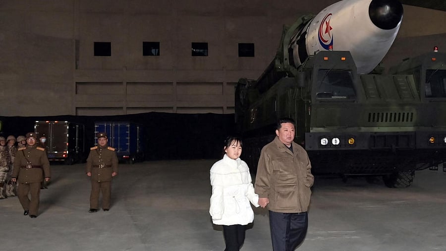 North Korean leader Kim Jong Un, along with his daughter, inspects an ICBM. Photo Credit: Reuters/ KCNA