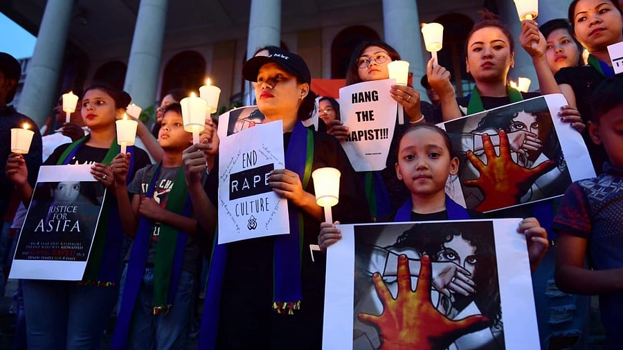 In this Aug. 18, 2018 file photo, people from North East Association during a candle light vigil protest demanding justice in Kathua gang-rape and murder case. The Supreme Court held that one of the accused was not a juvenile at the time of the offence and be tried afresh as an adult, on Wednesday, Nov. 16, 2022. Credit: PTI File Photo