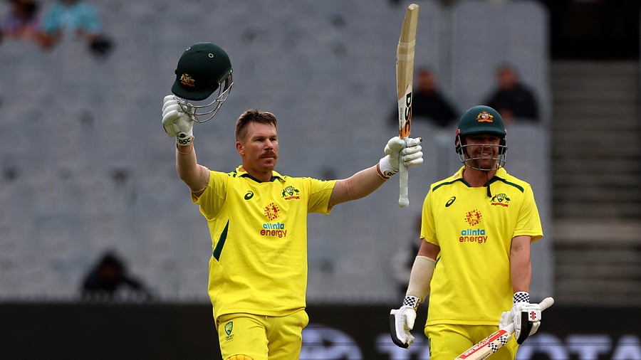 Head and Warner forged a 269-run stand, the highest opening partnership at the MCG, as Australia amassed 355-5. Credit: AP Photo