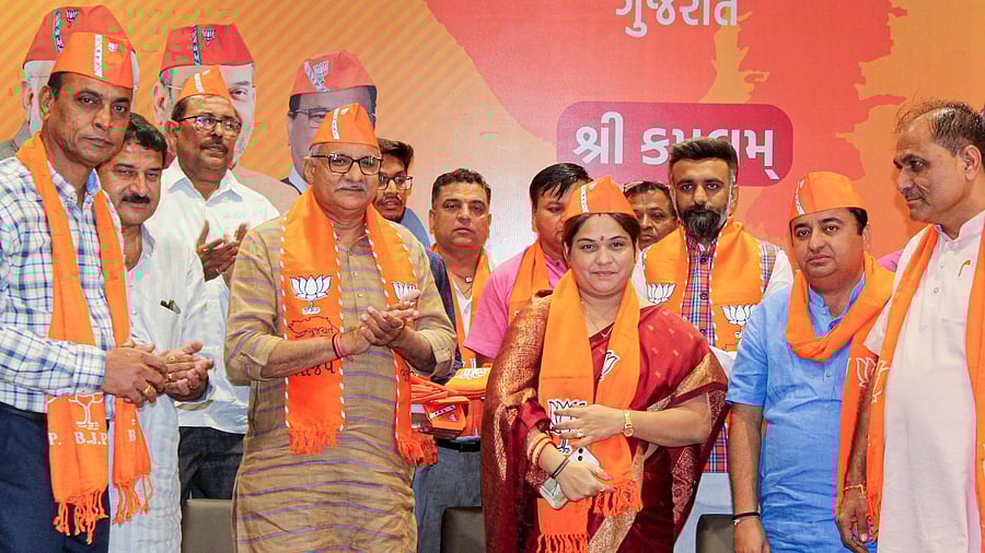 Former Congress MLA Kaminiba Rathod joins Bharatiya Janata Party (BJP) ahead of the upcoming Gujarat Assembly elections, in Gandhinagar. Credit: PTI Photo