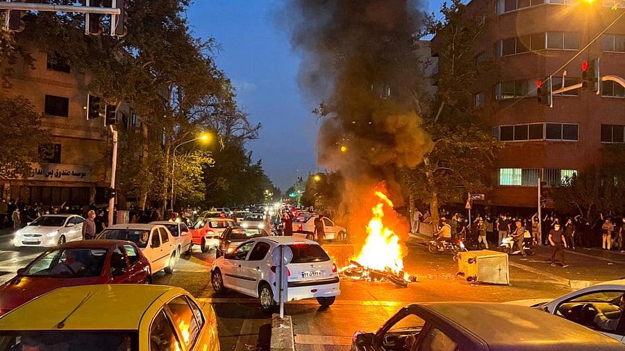 Protest over the death of Mahsa Amini, in Tehran. Credit: Reuters File Photo
