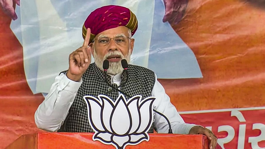 Prime Minister Narendra Modi speaks during a public meeting ahead of the Gujarat Assembly elections, in Surendranagar, Monday, Nov. 21, 2022. Credit: PTI Photo