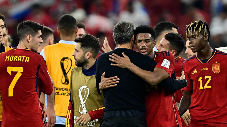 Spain's coach #00 Luis Enrique congratulates his team on their victory after the Qatar 2022 World Cup Group E football match between Spain and Costa Rica. Credit: AFP Photo