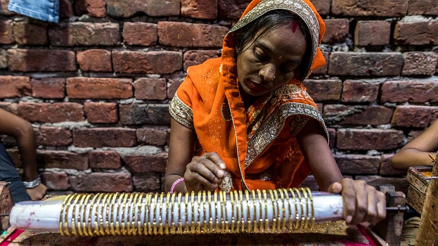 Women-led businesses also witnessed more layoffs. Credit: AFP Photo